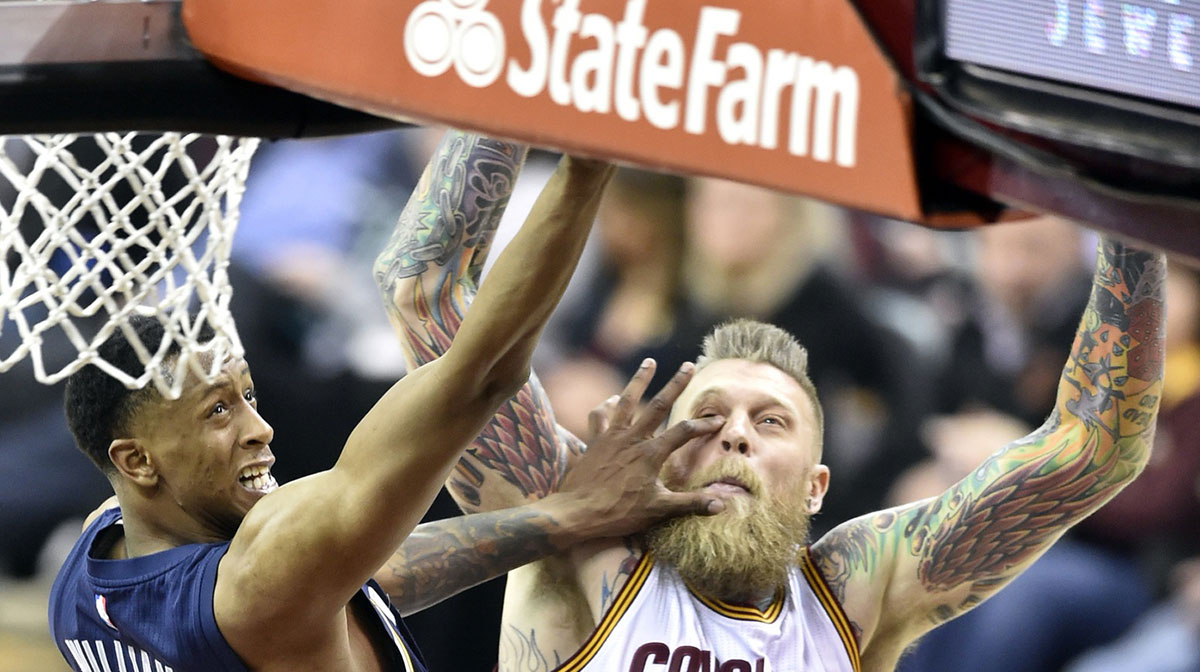 Memphis Grizzlies forward Troy Williams (10) drives to the basket against Cleveland Cavaliers forward Chris Andersen (00) in the fourth quarter at Quicken Loans Arena.