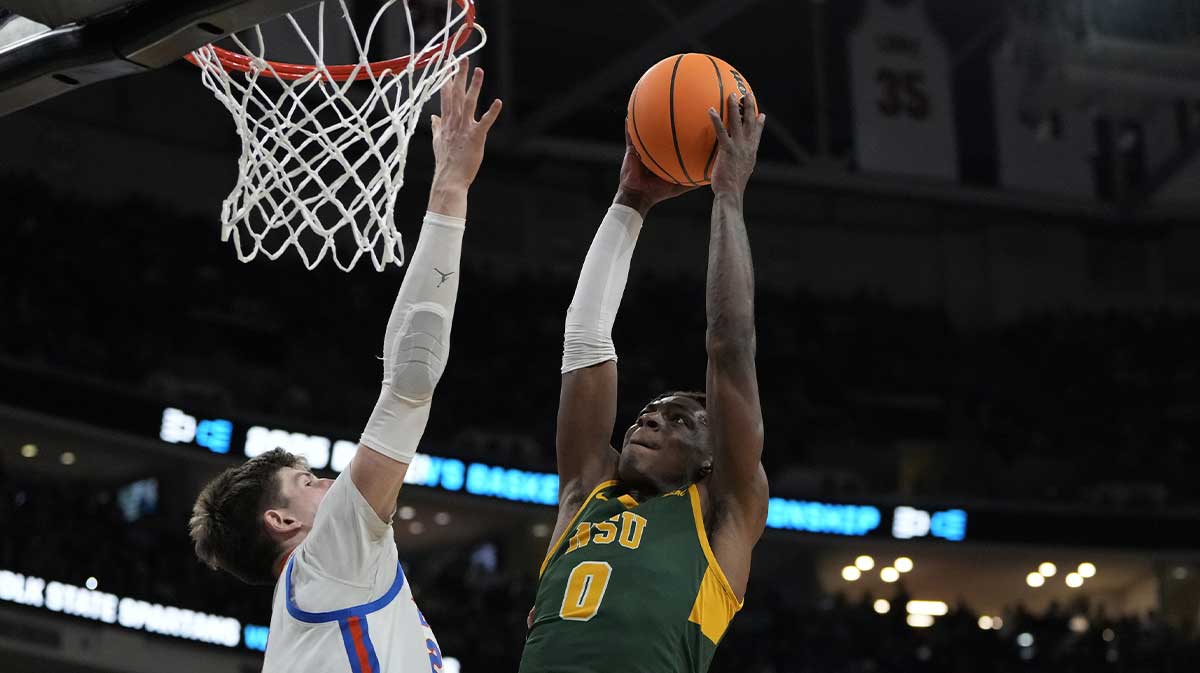 Norfolk State Spartans guard Christian Ings (0) drives to the basket against Florida Gators