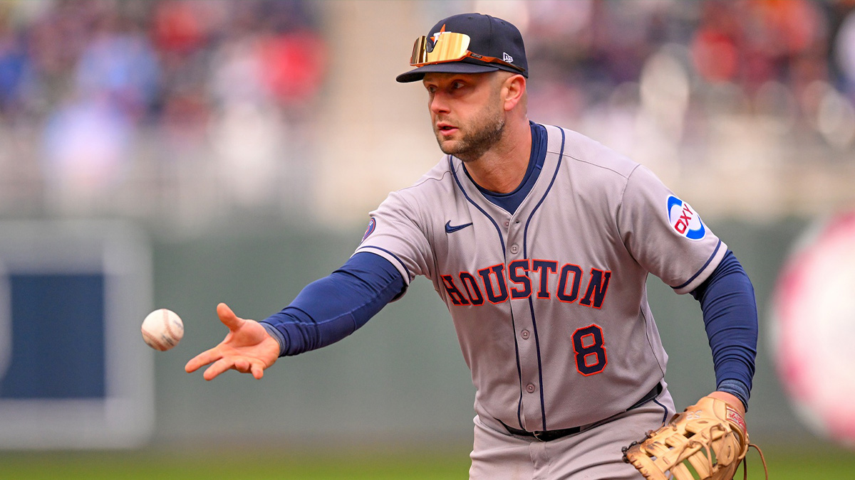 Houston Astros infielder Christian Walker (8) flips the ball to first for a force out against the Minnesota Twins during the fifth inning at Target Field.