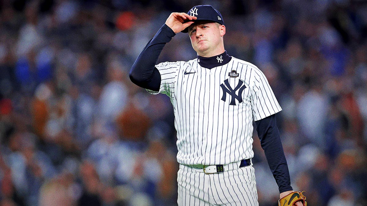 New York Yankees pitcher Clarke Schmidt (36) reacts after getting the last out against the Los Angeles Dodgers in the top of the first inning in game three of the 2024 MLB World Series at Yankee Stadium.