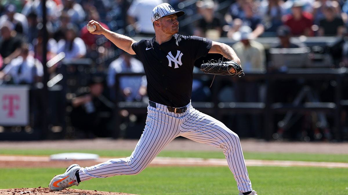 New York Yankees pitcher Clarke Schmidt (36) throws a pitch against the Baltimore Orioles in the first inning during spring training at George M. Steinbrenner Field.