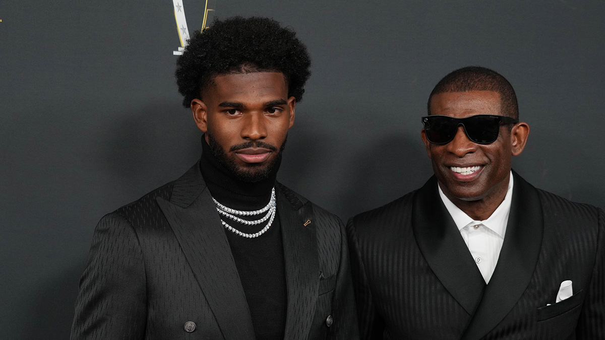 Deion Sanders (right) with his son Shedeur Sanders on the red carpet before Super Bowl LIX NFL Honors at Saenger Theatre.