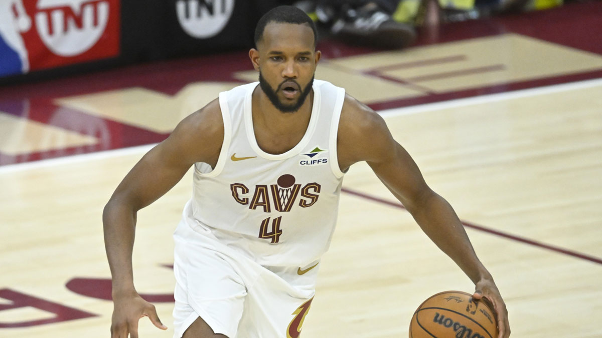Cleveland Cavaliers forward Evan Mobley (4) dribbles the ball in the fourth quarter against the Miami Heat at Rocket Arena.