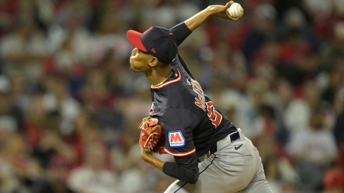 Cleveland Guardians relief pitcher Triston McKenzie (24) delivers to the plate in the fifth inning against the Los Angeles Angels at Angel Stadium.