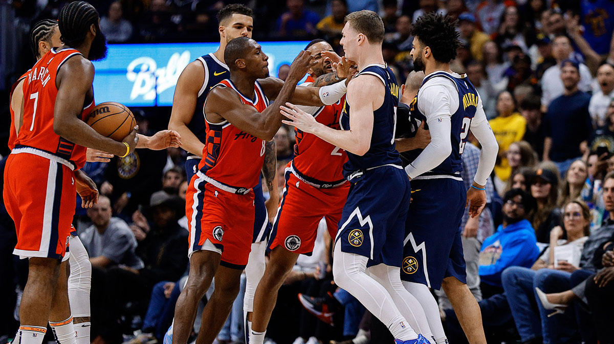 Denver Nuggets guard Jamal Murray (27) reacts after a play with Los Angeles Clippers guard Norman Powell (24) as guard Kris Dunn (8) and guard Christian Braun (0) push each other as forward Michael Porter Jr. (1) looks on in the third quarter during game two of first round for the 2025 NBA Playoffs at Ball Arena.