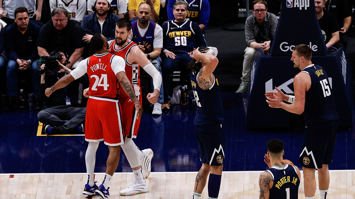 Los Angeles Clippers center Ivica Zubac (40) reacts with guard Norman Powell (24) after drawing a foul as forward Aaron Gordon (32) and center Nikola Jokic (15) react in the fourth quarter during game two of first round for the 2025 NBA Playoffs at Ball Arena.