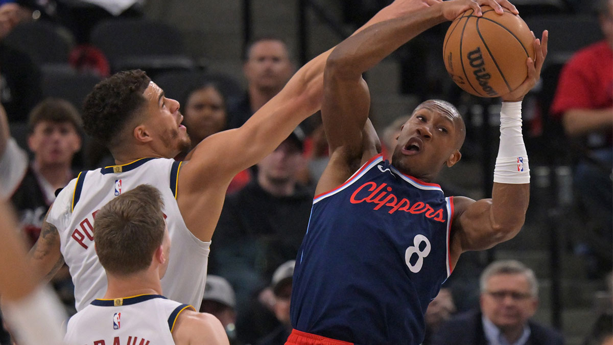 Denver Nuggets forward Michael Porter Jr. (1) defends Los Angeles Clippers guard Kris Dunn (8) in the first half of game four of round one of the 2024 NBA Playoffs at Intuit Dome.