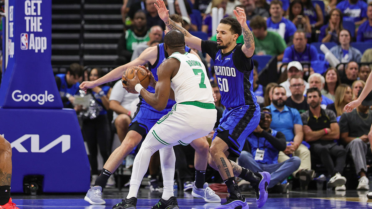 Orlando Magic guard Cole Anthony (50) defends Boston Celtics guard Jaylen Brown (7) during the second quarter of game three of first round for the 2025 NBA Playoffs at Kia Center.