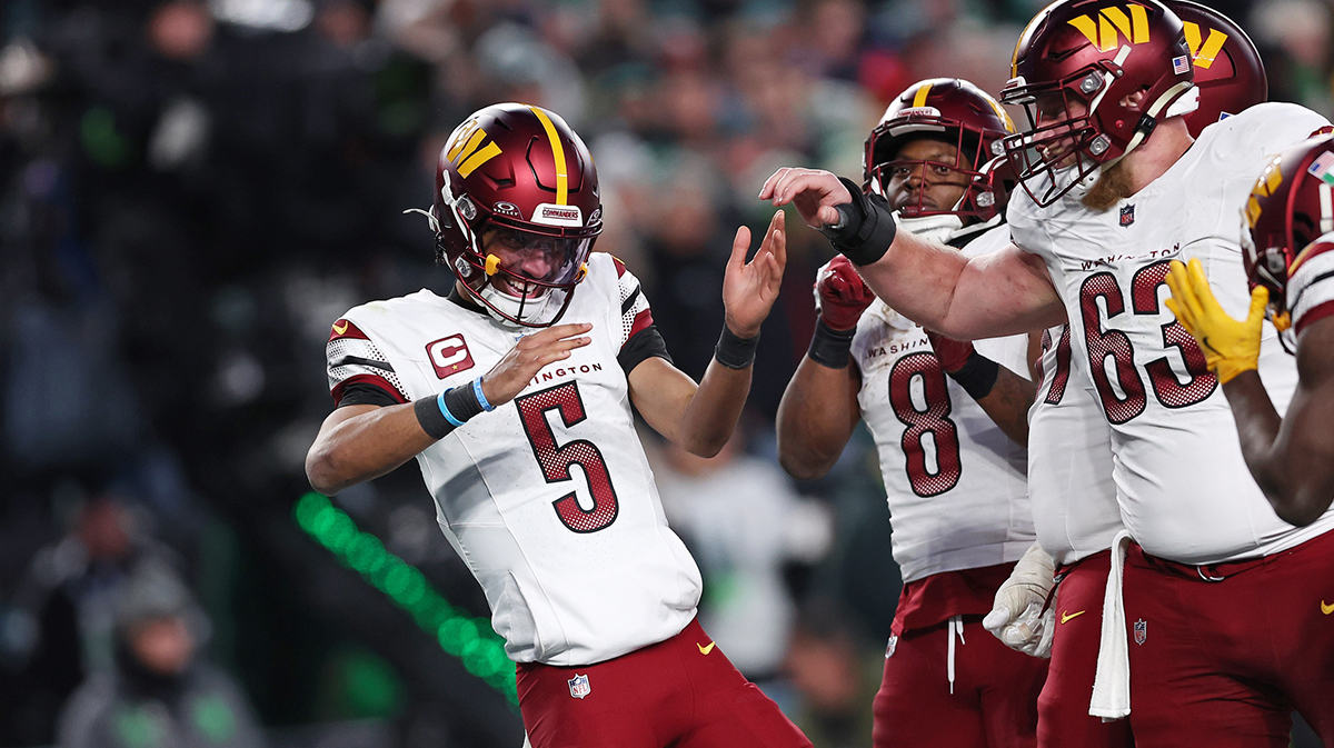 Washington Commanders quarterback Jayden Daniels (5) celebrates after a play against the Philadelphia Eagles during the second half in the NFC Championship game at Lincoln Financial Field.