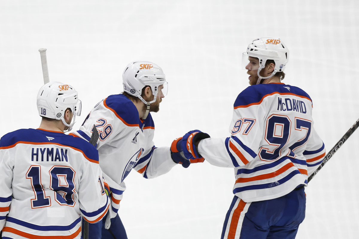 Edmonton Oilers center Leon Draisaitl (29) celebrates with Oilers center Connor McDavid (97) after scoring a goal against the Washington Capitals in the first period at Capital One Arena.