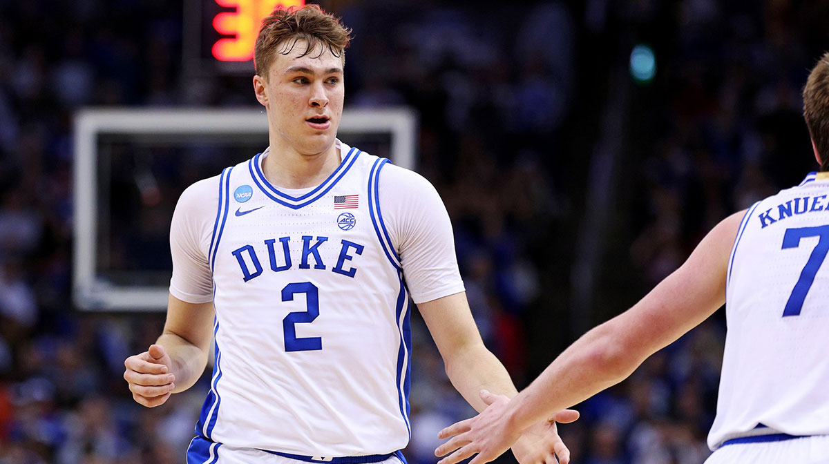 Duke Blue Devils forward Cooper Flagg (2) celebrates with guard Kon Knueppel (7) during the second half against the Alabama Crimson Tide in the East Regional final of the 2025 NCAA tournament at Prudential Center.