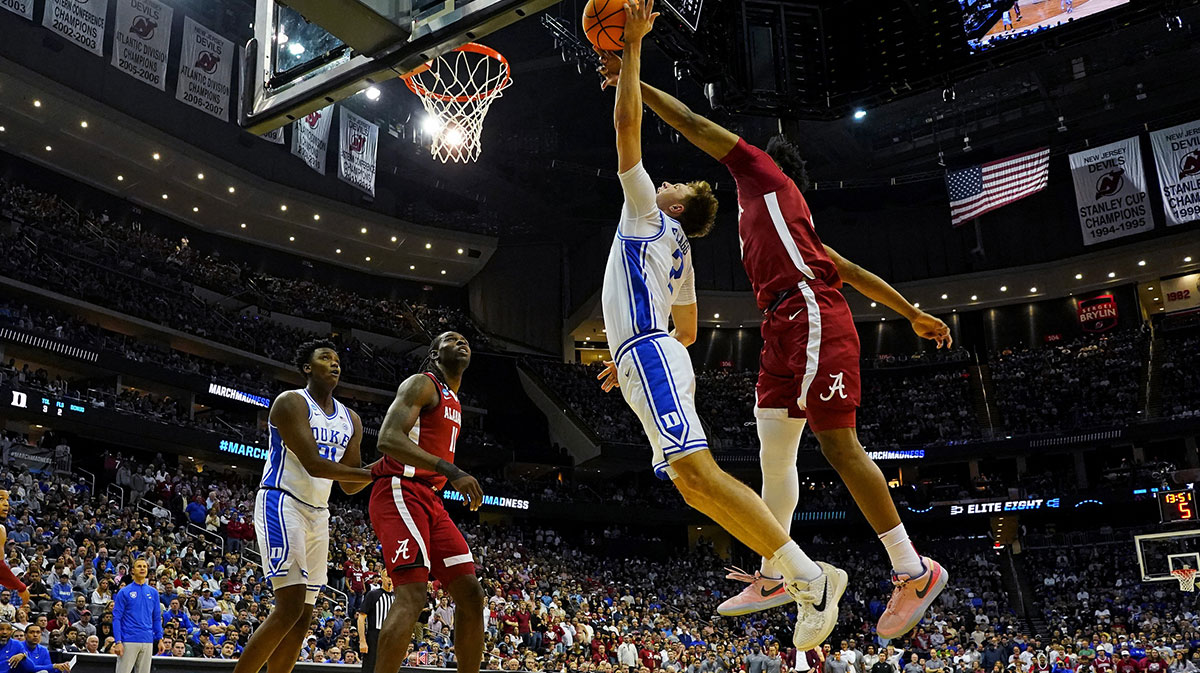 Duke Blue Devils forward Cooper Flagg (2) shoots the ball against Alabama Crimson Tide forward Mouhamed Dioubate (10) during the second half in the East Regional final of the 2025 NCAA tournament at Prudential Center.