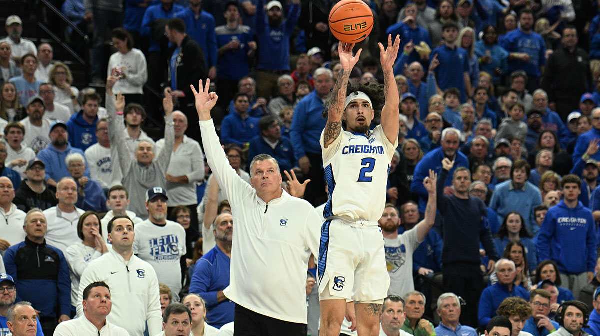Creighton Bluejays head coach Greg McDermott watches as guard Pop Isaacs (2) attempts a three point shot against the Kansas Jayhawks during the second half at CHI Health Center Omaha.