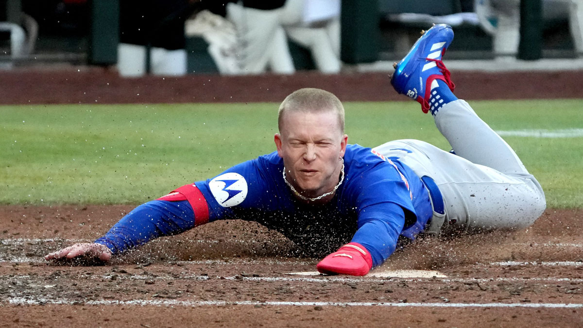 Chicago Cubs outfielder Pete Crow-Armstrong (4) scores a run against the Arizona Diamondbacks in the third inning at Chase Field.