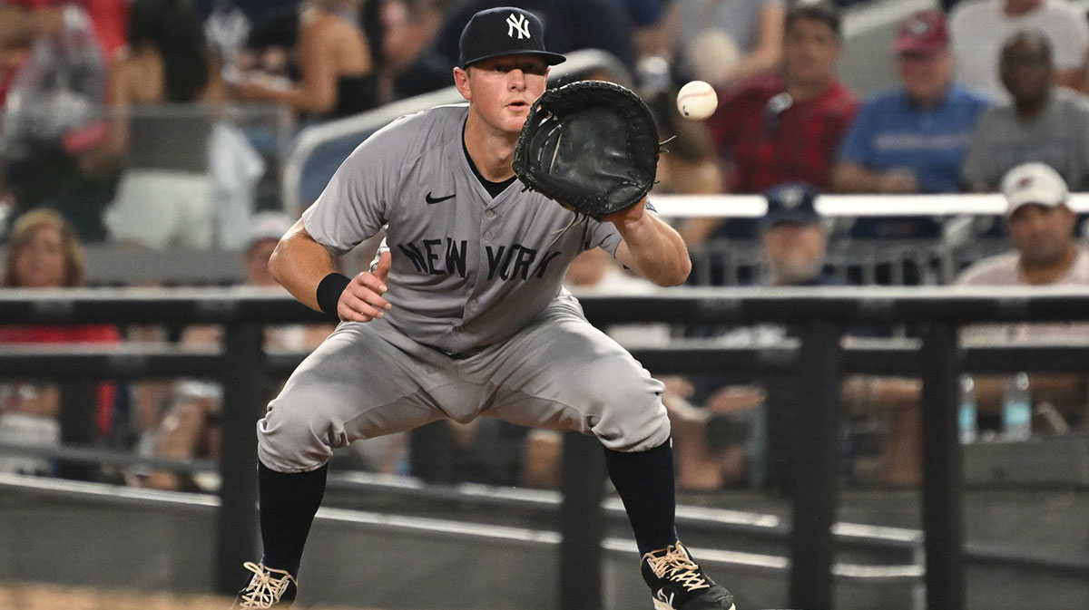 New York Yankees third baseman DJ LeMahieu (26) fields the ball at first base against the Washington Nationals during the fourth inning at Nationals Park.
