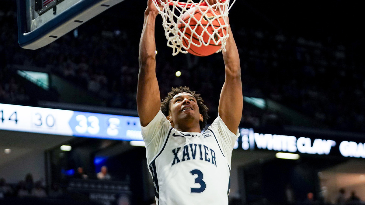 Xavier Musketeers guard Dailyn Swain (3) dunks the ball in the second half of a NCAA men’s basketball game between the Xavier Musketeers and Creighton Bluejays, Saturday, March 1, 2025, at Cintas Center in Cincinnati. Musketeers won 83-61.