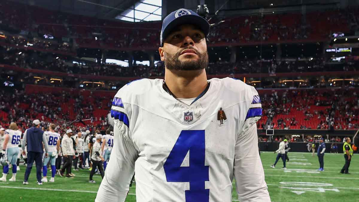 Dallas Cowboys quarterback Dak Prescott (4) walks off the field after a game against the Atlanta Falcons at Mercedes-Benz Stadium.