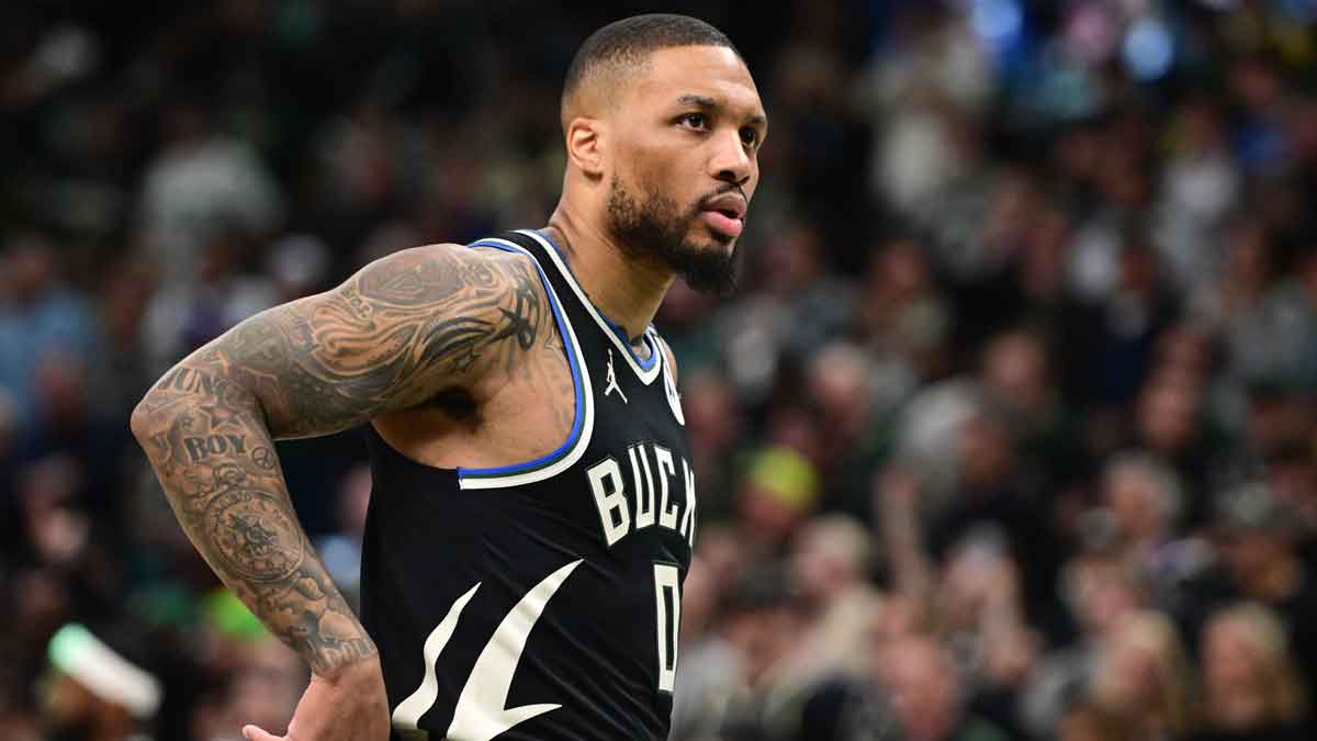 Milwaukee Bucks guard Damian Lillard (0) looks on in the first quarter during game four against the Indiana Pacers of first round for the 2024 NBA Playoffs at Fiserv Forum. Lillard left the game early in the in the first quarter with an injury. Mandatory Credit: Benny Sieu-Imagn Images