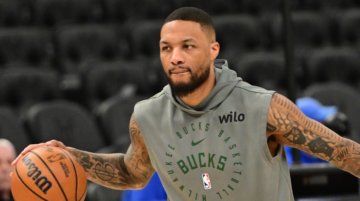 Milwaukee Bucks guard Damian Lillard (0) warms up before game against the Oklahoma City Thunder at Fiserv Forum.