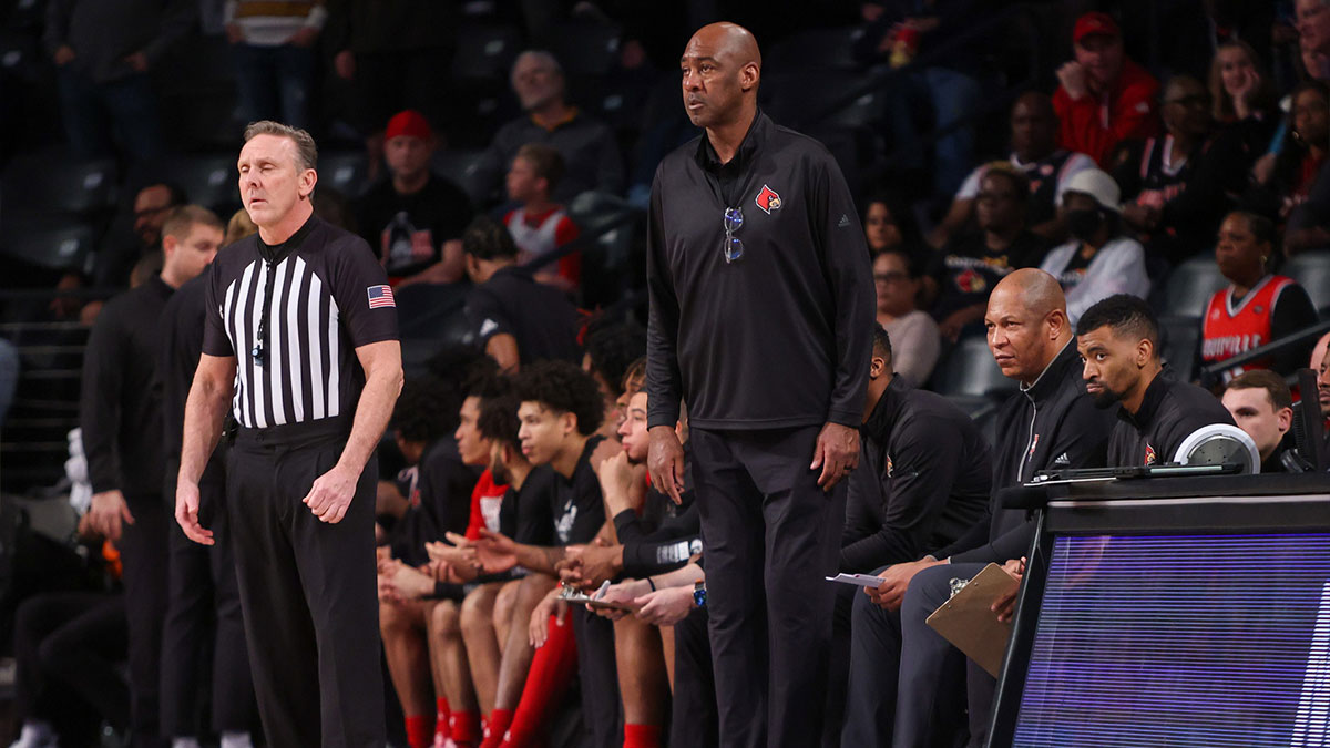 Louisville Cardinals assistant coach Danny Manning on the bench against the Georgia Tech Yellow Jackets in the first half at McCamish Pavilion.