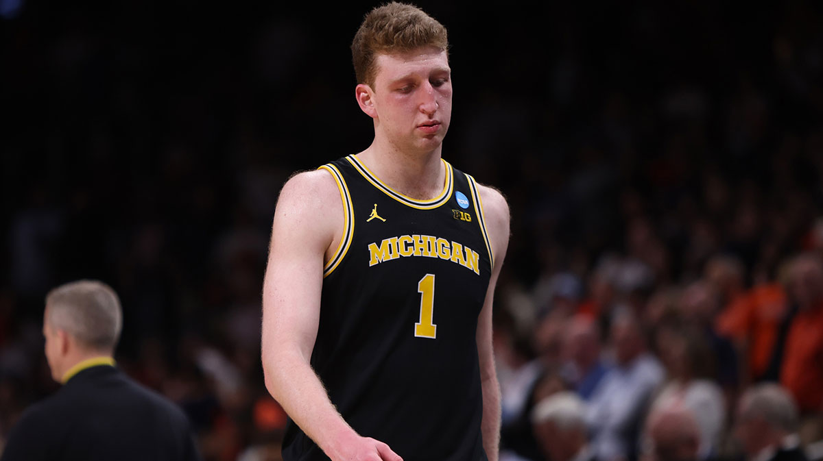Michigan Wolverines center Danny Wolf (1) reacts after losing to the Auburn Tigers in a South Regional semifinal of the 2025 NCAA tournament at State Farm Arena