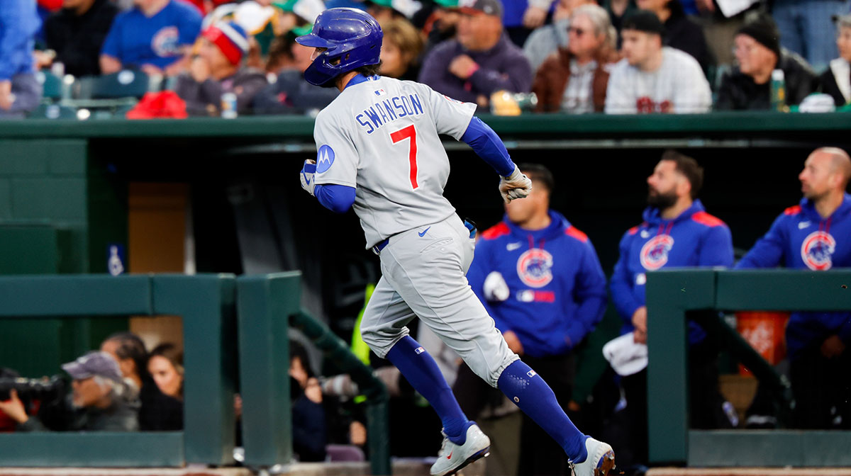Chicago Cubs shortstop Dansby Swanson (7) hits a home run during the first inning against the Athletics at Sutter Health Park.