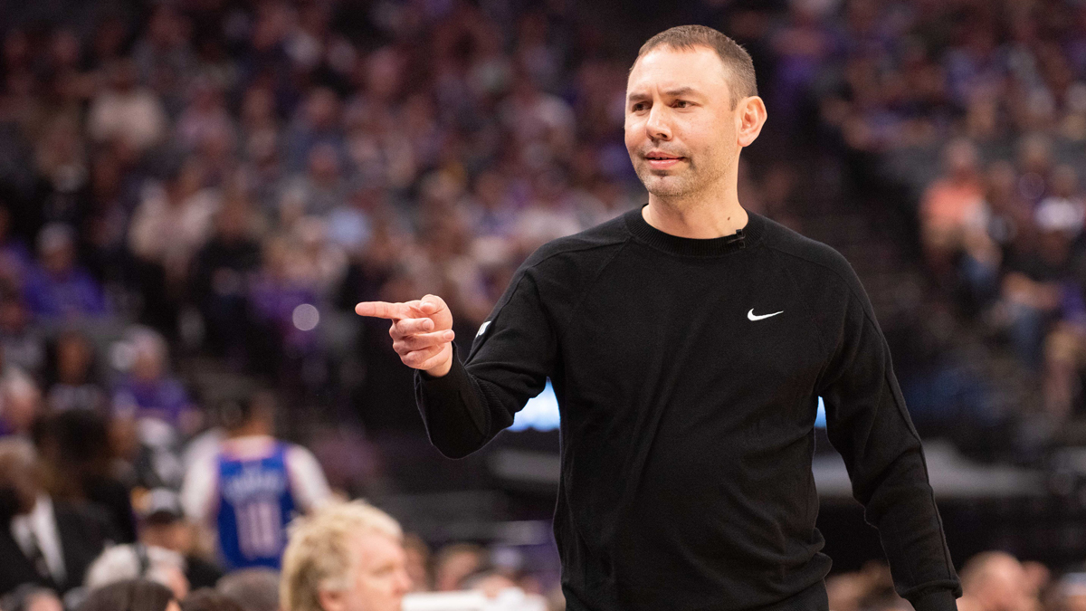 Denver Nuggets interim head coach David Adelman points to his bench during the first quarter of the game against the Sacramento Kings at Golden 1 Center.
