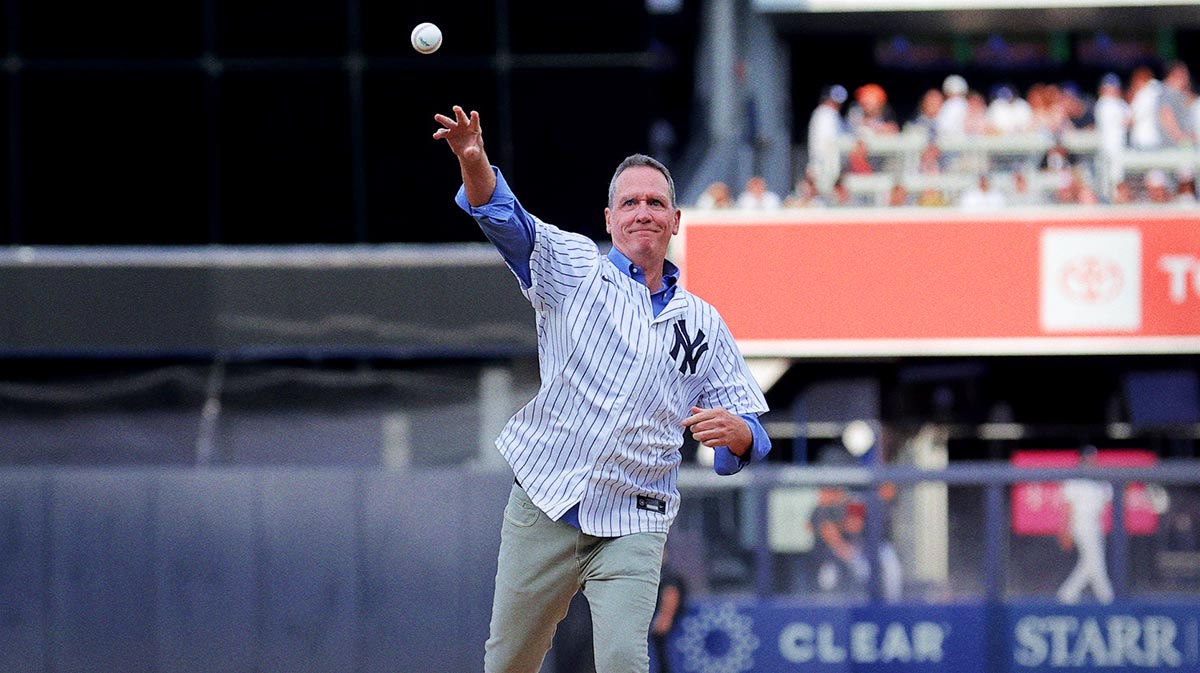 New York Mets and New York Yankees former pitcher David Cone throws a ceremonial first pitch before a subway series game between the two teams at Yankee Stadium.