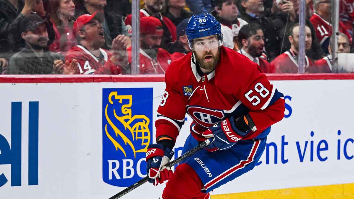 Montreal Canadiens defenseman David Savard (58) plays the puck near the boards against the Chicago Blackhawks in the first period at Bell Centre.