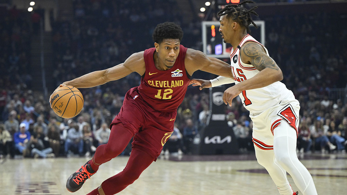Cleveland Cavaliers forward De'Andre Hunter (12) dribbles bees Chicago Bulls guard Jahmir Young (17) in the first quarter at Rocket Arena.