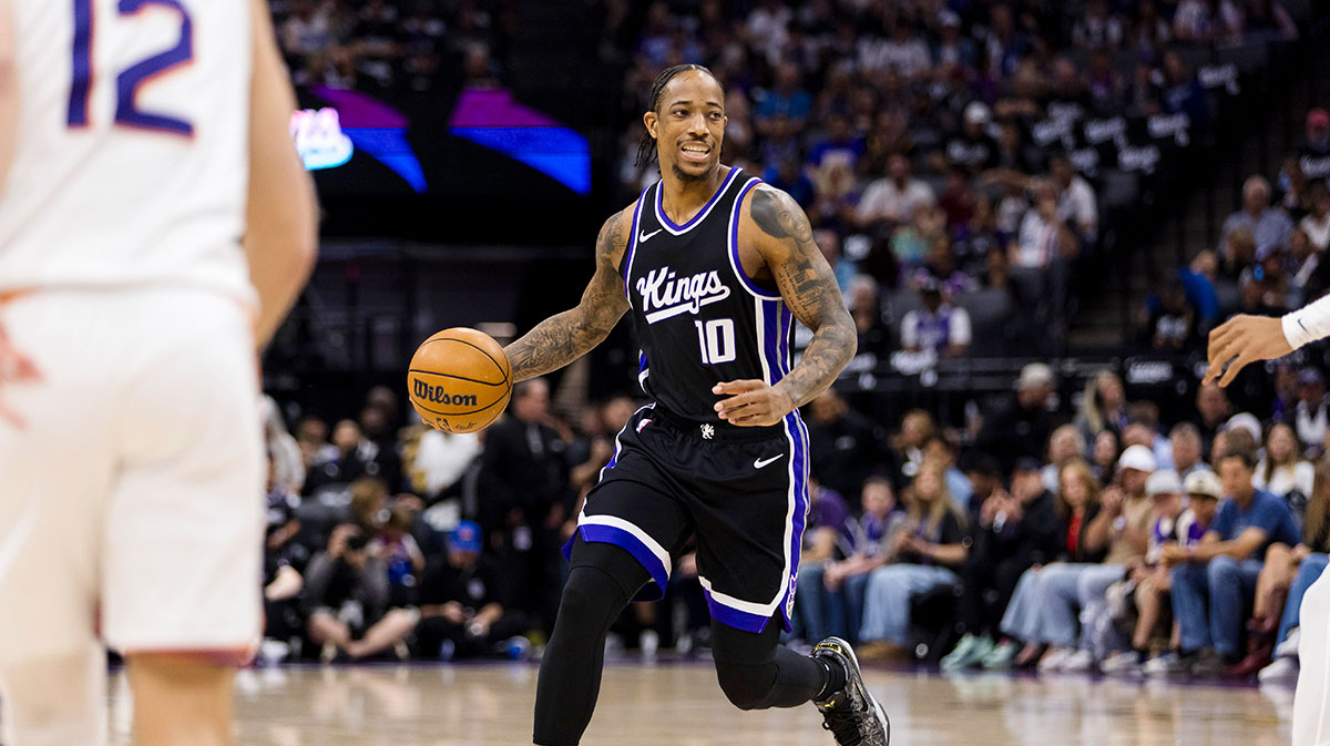 Sacramento Kings forward DeMar DeRozan (10) dribbles against the Phoenix Suns during the first quarter at Golden 1 Center.