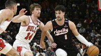 Portland Trail Blazers forward Deni Avdija (8) moves the ball against Chicago Bulls forward Matas Buzelis (14) during the first half at United Center.