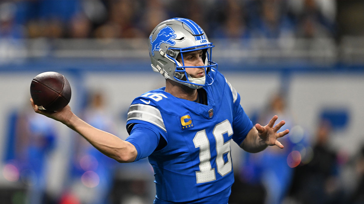 Detroit Lions quarterback Jared Goff (16) throws a pass during the third quarter against the Washington Commanders in a 2025 NFC divisional round game at Ford Field.