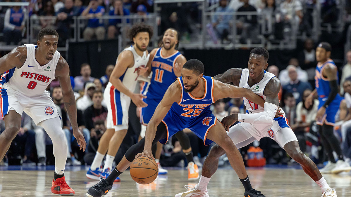 New York Knicks forward Mikal Bridges (25) controls the ball in front of Detroit Pistons guard Dennis Schroder (17) during the fourth quarter of game four of first round for the 2025 NBA Playoffs at Little Caesars Arena.