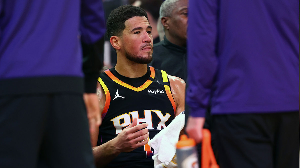 Phoenix Suns guard Devin Booker (1) reacts on the bench against the Oklahoma City Thunder during the second half at Footprint Center.