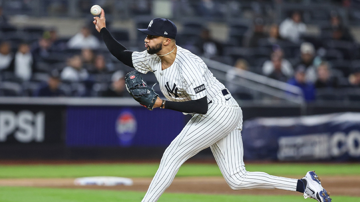 Apr 15, 2025; Bronx, New York, USA; New York Yankees relief pitcher Devin Williams (38) pitches in the ninth inning against the Kansas City Royals at Yankee Stadium. All players wore #42 for Jackie Robinson Day.