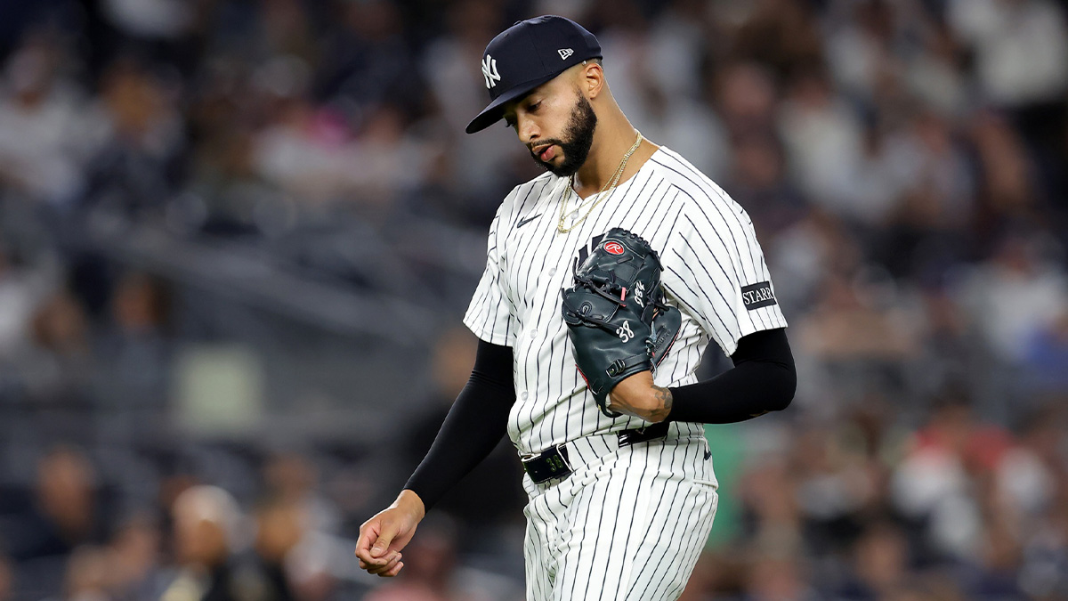 Apr 25, 2025; Bronx, New York, USA; New York Yankees relief pitcher Devin Williams (38) reacts as he walks off the field after being taken out of the game against the Toronto Blue Jays during the ninth inning at Yankee Stadium. Mandatory Credit: Brad Penner-Imagn Images