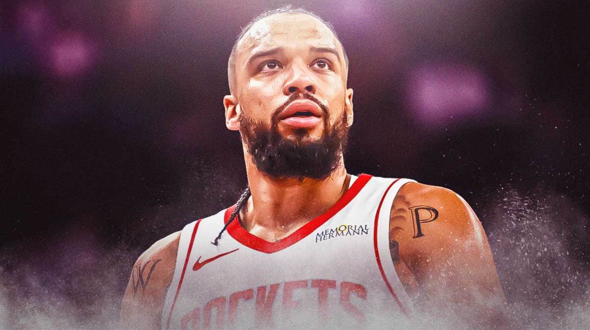 Houston Rockets player Dillon Brooks with the Rockets arena in the background