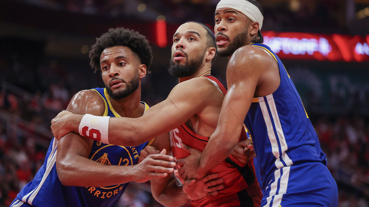 Golden State Warriors forward Braxton Key (12) and guard Moses Moody (4) try to block out Houston Rockets forward Dillon Brooks (9) in the fourth quarter during game five of first round for the 2025 NBA Playoffs at Toyota Center.