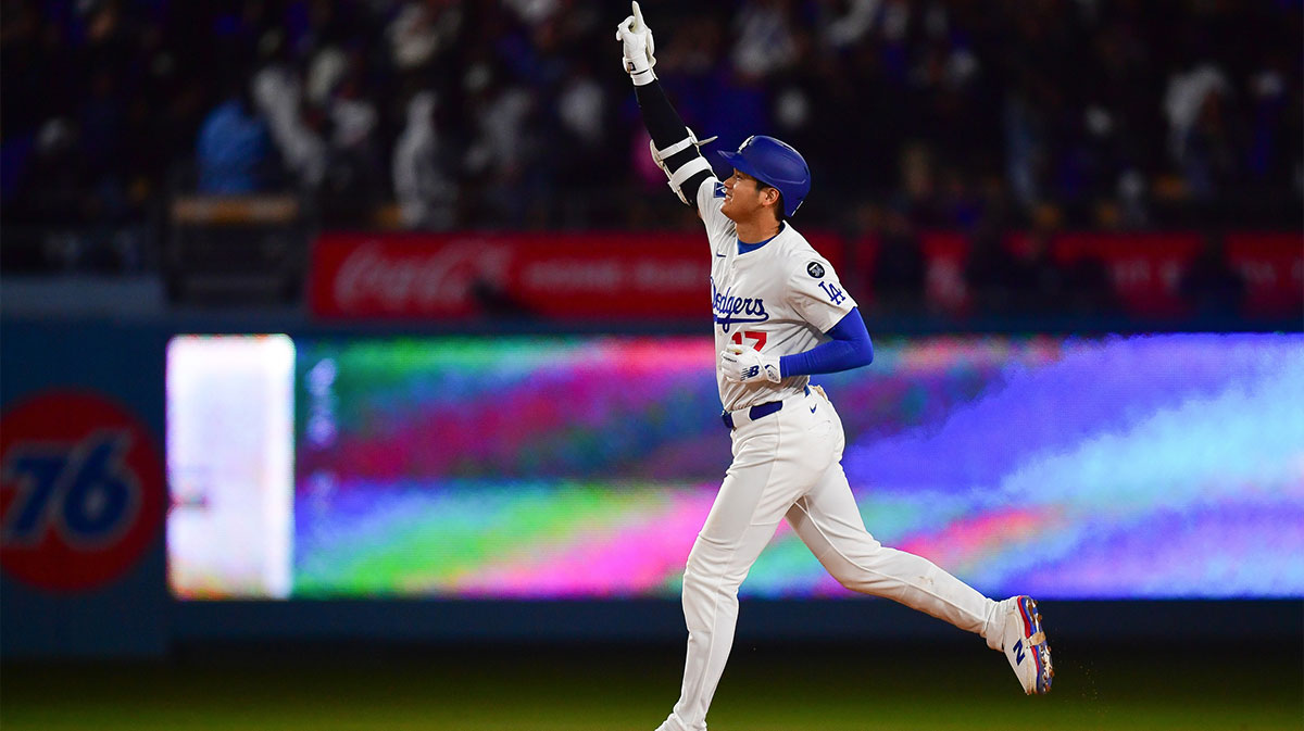 Los Angeles Dodgers designated hitter Shohei Ohtani (17) rounds the bases after hitting a walk off solo home run against the Atlanta Braves during the ninth inning at Dodger Stadium.