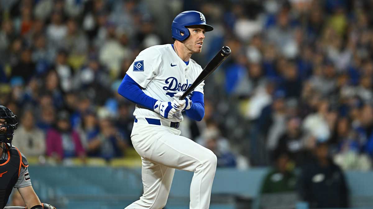 Los Angeles Dodgers first baseman Freddie Freeman (5) hits a double in the seventh inning against the Detroit Tigers at Dodger Stadium.