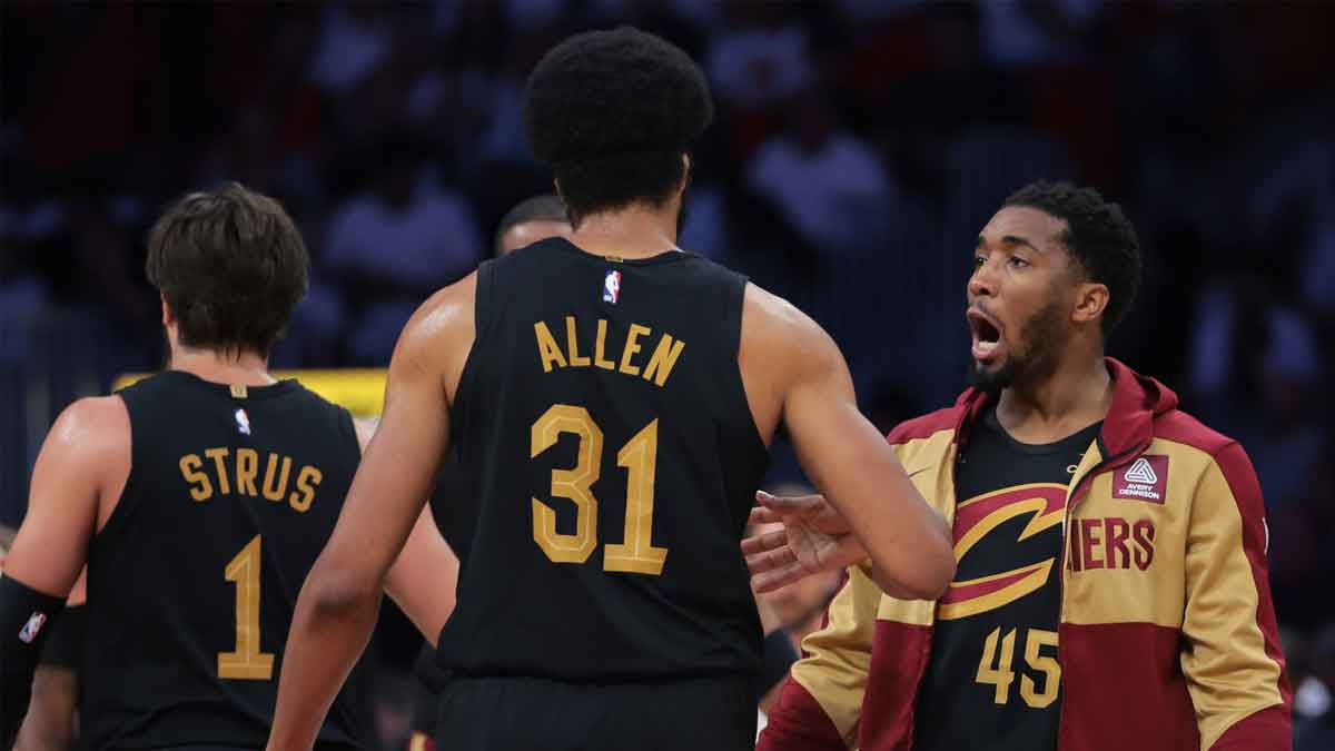 Cleveland Cavaliers guard Donovan Mitchell (45) celebrates with center Jarrett Allen (31) against the Miami Heat in the second quarter during game four for the first round of the 2025 NBA Playoffs at Kaseya Center.