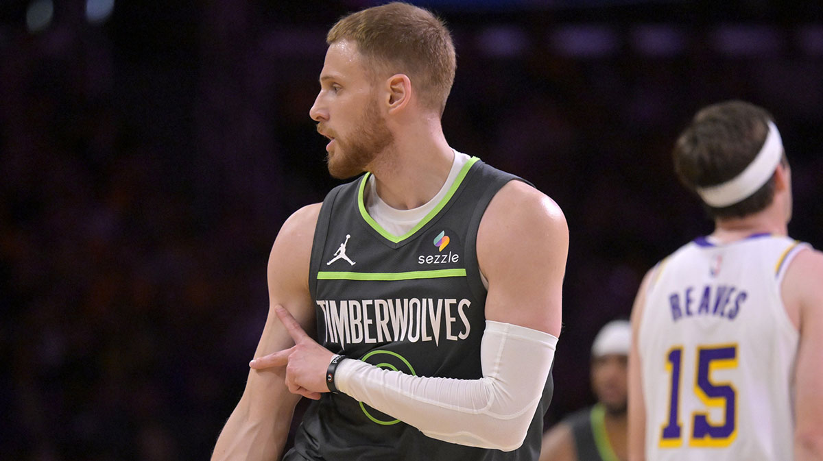 Minnesota Timberwolves guard Donte DiVincenzo (0) celebrates after a 3-point basket in the first half against the Los Angeles Lakers at Crypto.com Arena.
