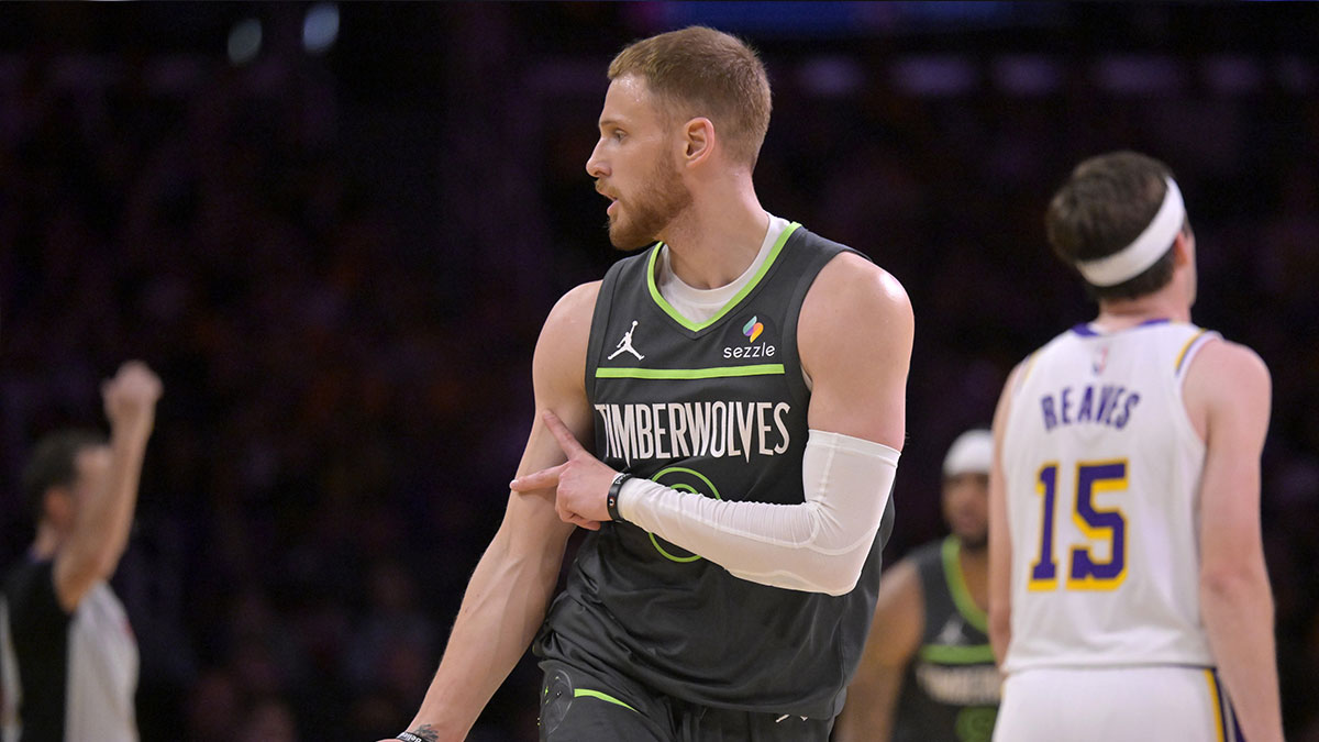Minnesota Timberwolves guard Donte DiVincenzo (0) celebrates after a 3-point basket in the first half against the Los Angeles Lakers at Crypto.com Arena.