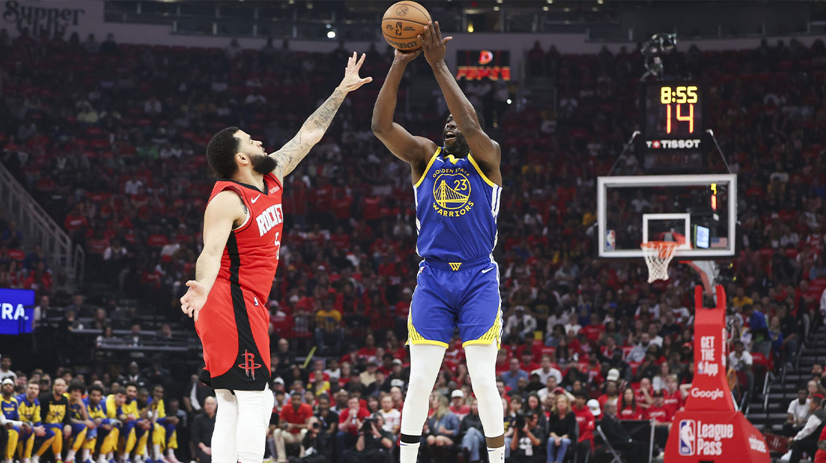 The striker of the Golden State Warriors Draymond Green (23) pulls the ball while the Houston Rockets goalkeeper Fred Vanvleet (5) defends during the first quarter at the Toyota Center. Compulsory credit: Troy Taormina-Imagn