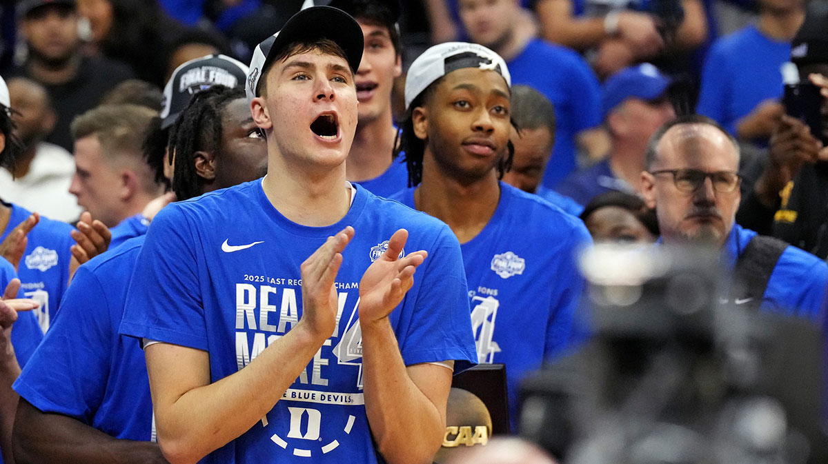 Duke Blue Devils forward Cooper Flagg (2) cheers as the Duke Blue Devils cuts down the nets after beating the Alabama Crimson Tide in the East Regional final of the 2025 NCAA tournament at Prudential Center.