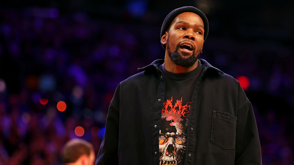 Phoenix Suns forward Kevin Durant looks on from the sidelines during the game between the Phoenix Suns and the New York Knicks at Footprint Center.