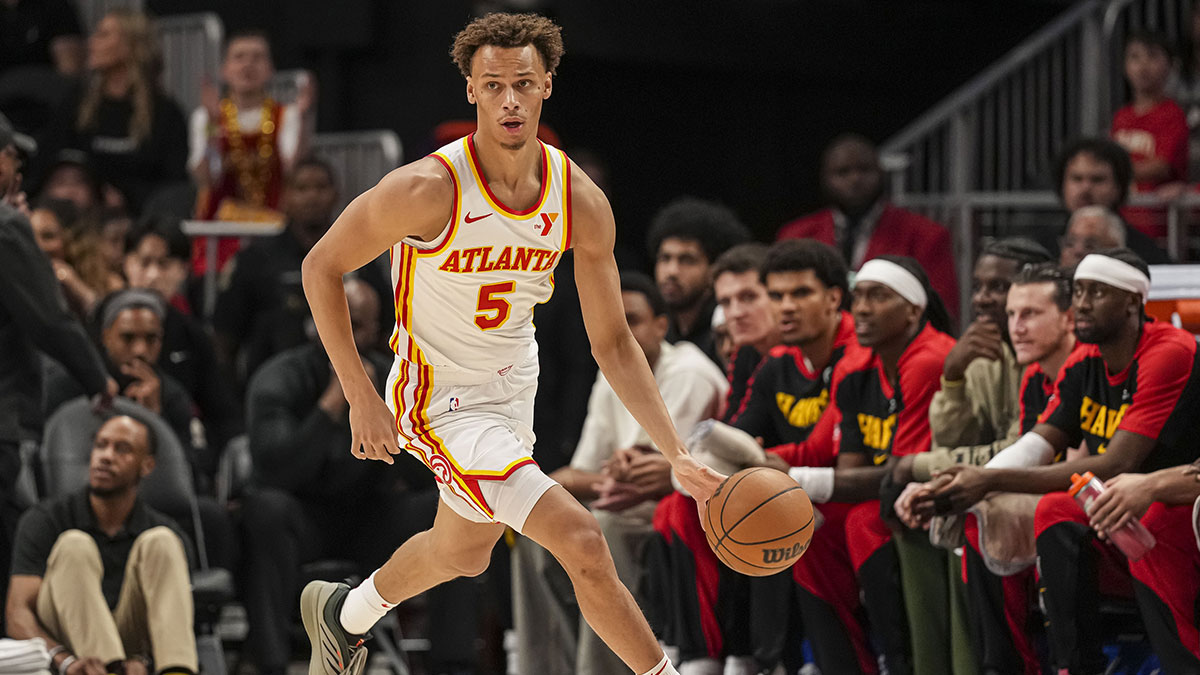 Atlanta Hawks guard Dyson Daniels (5) dribbles up the floor against the Portland Trail Blazers during the first half at State Farm Arena.
