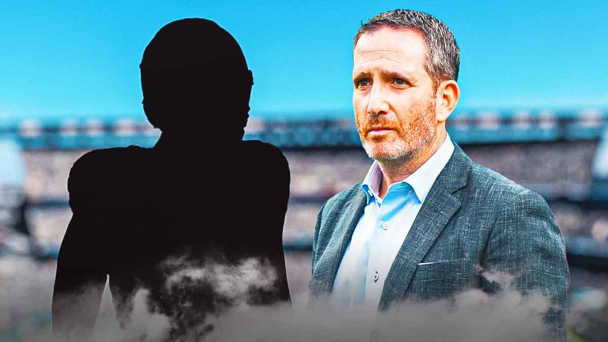 Howie Roseman next to the blacked-out silhouette of Josh Uche on the Eagles Field.
