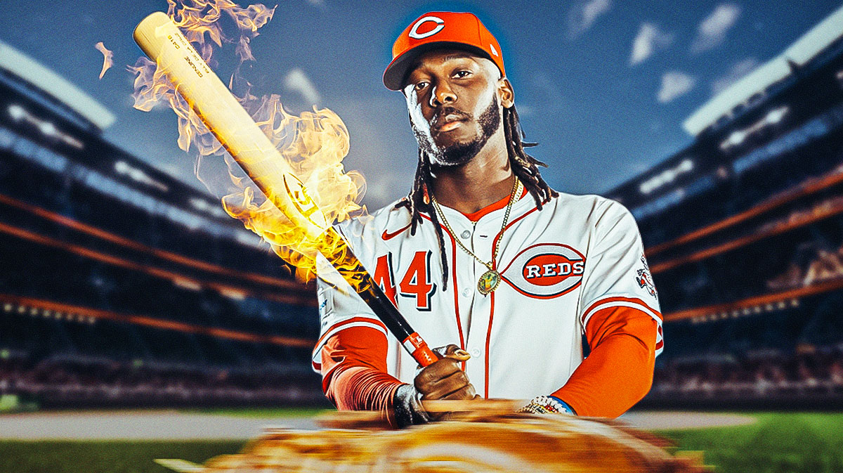 Elly De La Cruz swinging a bat with flames coming off of it.